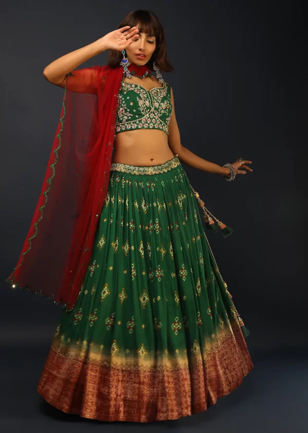 bottle_green_lehenga_in_silk_with_patola_printed