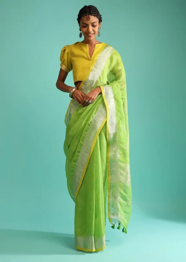 parrot-green-saree-in-linen-with-silver-brocade-border-and-striped-pallu-along-with-yellow-unstitched-blouse